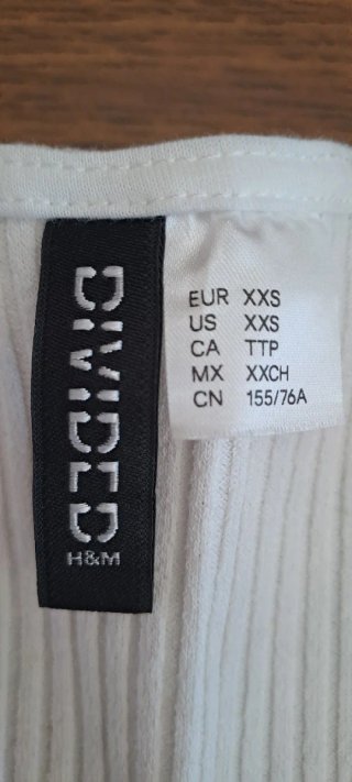 Top senza maniche H&M con catena argento