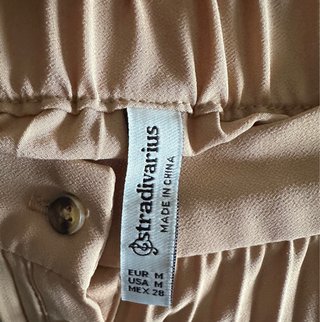 Falda plisada beige