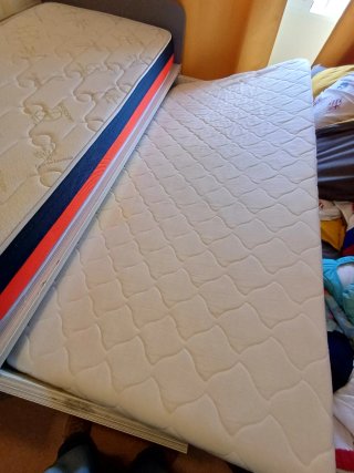 Cama nido doble con cajones.