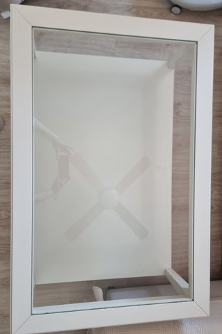 Mesa de centro blanca con cristal