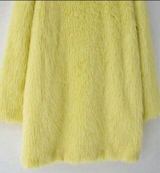 Abrigo pelo sintético amarillo