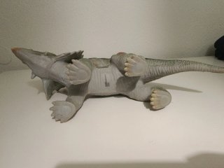 Muñeco Triceratops Verde con Puntos Rojos