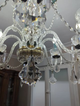 Lámpara de araña de cristal y metal