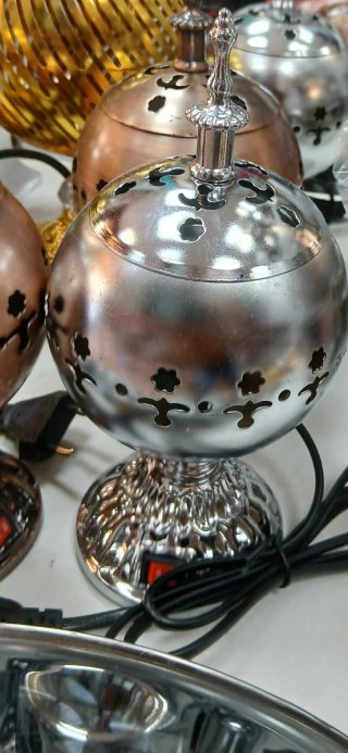 Tetera de metal decorada