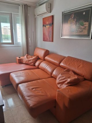 Sofá de piel naranja 3 plazas con chaiselongue