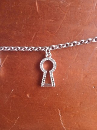 Pulsera plata y oro con charms