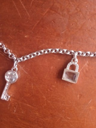 Pulsera plata y oro con charms