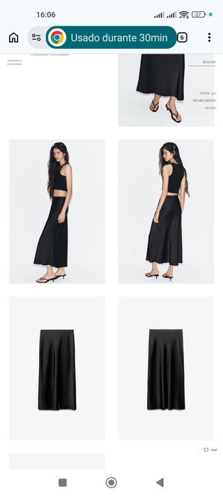 Falda midi satinada Zara negra | • Temporada 2026