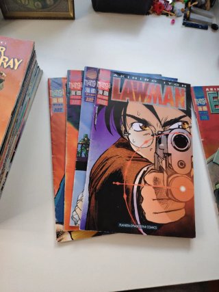 Set de 23 comics manga.