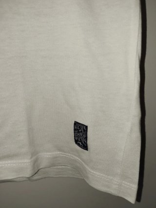 Camiseta blanca estampada palmeras