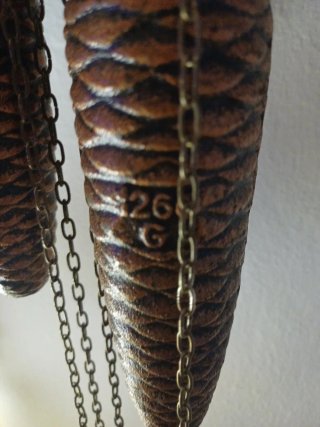 Orologio a cucù in legno intagliato