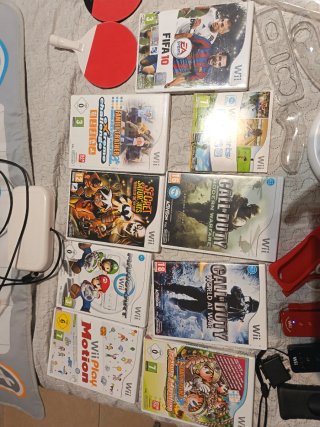 Lote de consola  Wii + juegos y accesorios