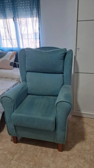 Butaca de tela color teal