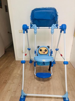 Columpio para bebé con capota azul