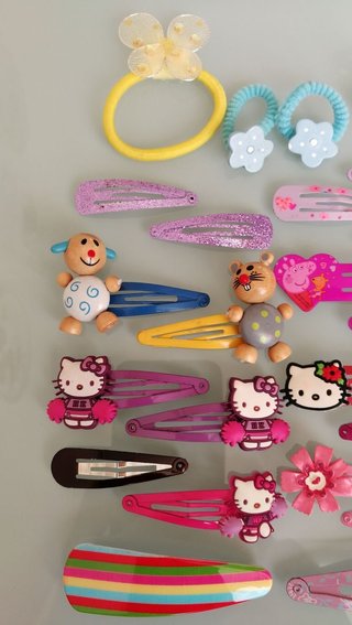 Set di 23 fermagli ed elastici per capelli bambina