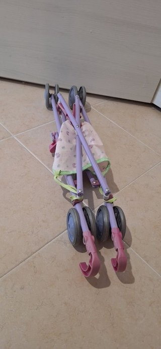 Passeggino giocattolo per bambole