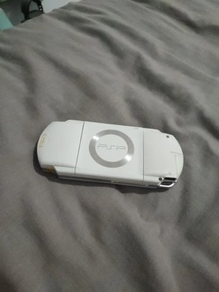 PSP 1004 Blanca con funda y cargador