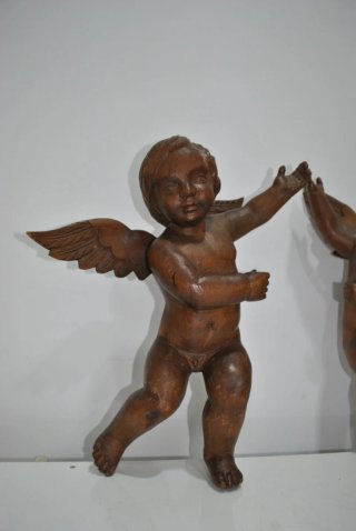 Antiguos angelitos querubines de madera tallada