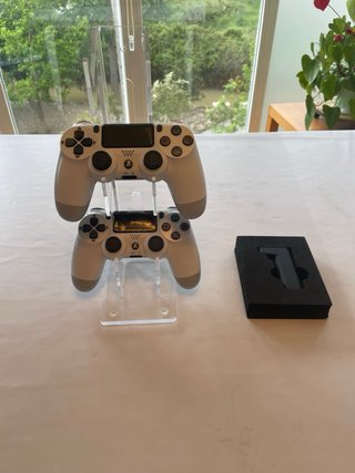 Mandos PS4 con cargador inalámbrico