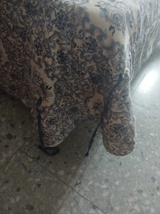 Colcha beige y azul