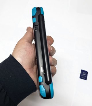 Nuovo Nintendo 2DS XL + Caricabatterie Originale + SD