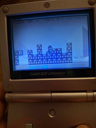 Game Boy Advance SP y cargador