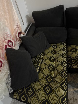 Sofá modular gris con almacenaje