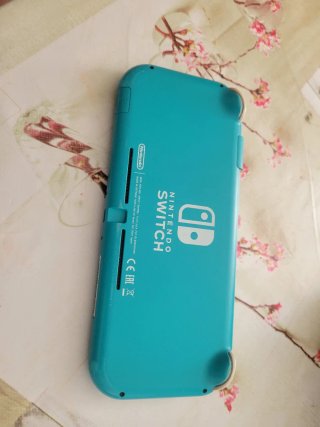 Nintendo Switch Lite Azul con 15 juegos incluidos