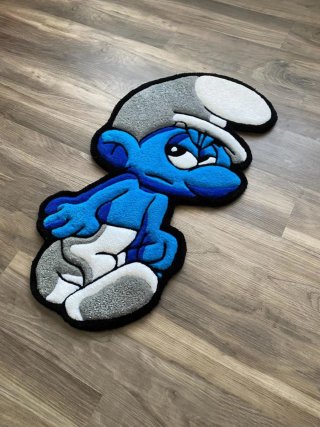 Alfombra de tela con diseño de personaje