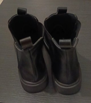 Botas elásticas negras nuevas sin etiqueta