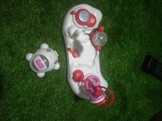 OPORTUNIDAD Andador infantil rosa con juguetes