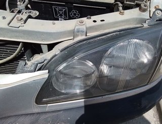Toyota 5323557 faro izq 54533366 avensis berlina