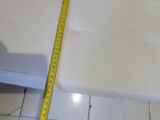 Puf de tela blanco