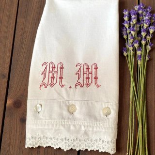 Funda de almohada antigua de lino con bordados
