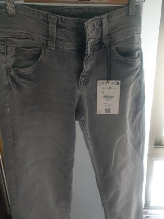 Pantalón vaquero gris mujer flare