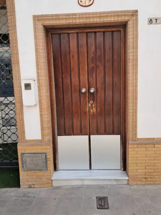 Puerta doble de madera de calle en pino macizo