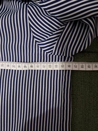 Blusa de rayas azul y blanco