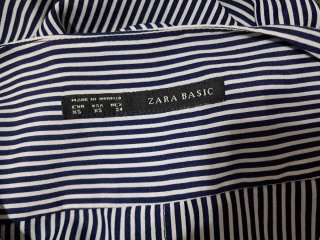 Blusa de rayas azul y blanco