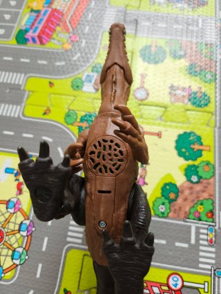 Dino articulado (pilas nuevas)marrón con rugidos