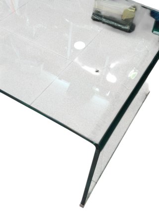 Mesa de centro de cristal curvado