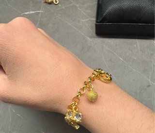 Bracciale placcato oro 18k con ciondoli
