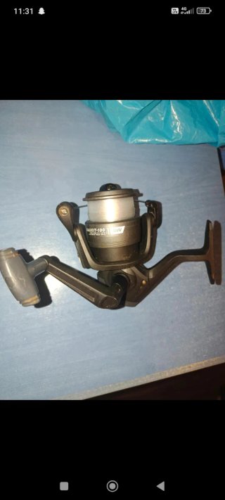 Carrete de pesca SAUXIT-100 SW