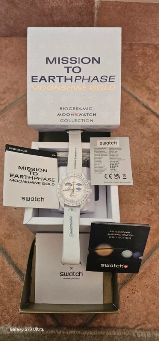Omega Swatch Earthphase Moonshine Gold NUOVO