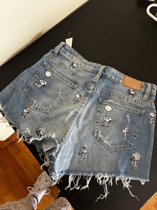 Pantalón corto vaquero Snoopy