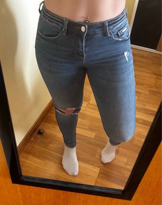 Pantalón vaquero desgastado