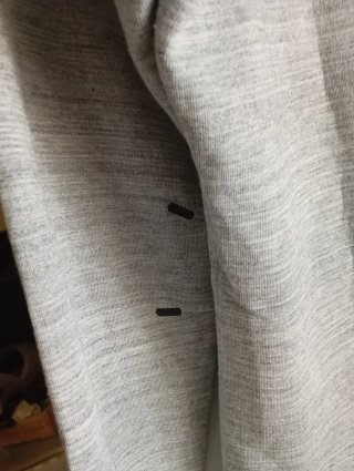 Chaqueta Nike gris con cremallera