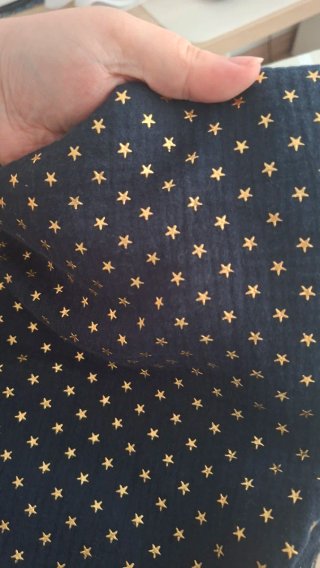 Retal tela azul con estrellas doradas