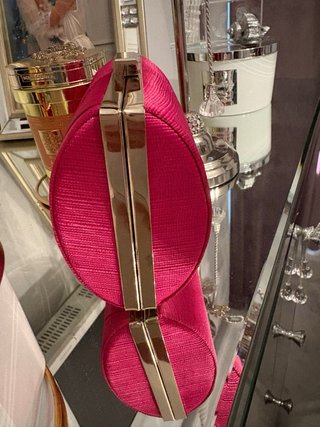 Bolso de fiesta fucsia y dorado