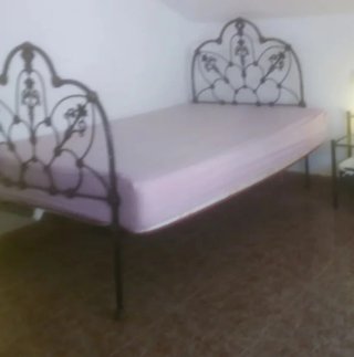 Cama antigua hierro forjado