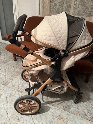 Carrito de bebé color beige